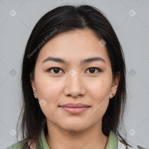 Joyful latino young-adult female with medium  brown hair and brown eyes