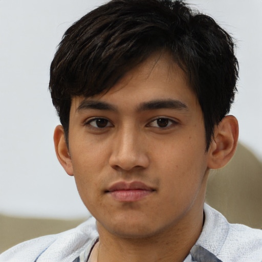 Neutral asian young-adult male with short  brown hair and brown eyes