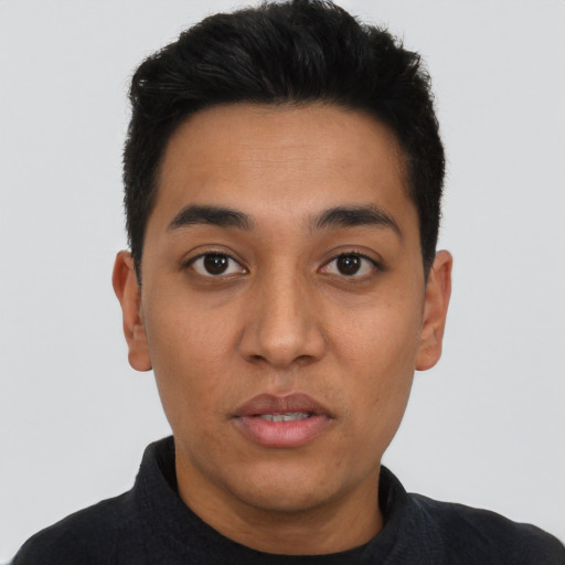 Neutral latino young-adult male with short  black hair and brown eyes