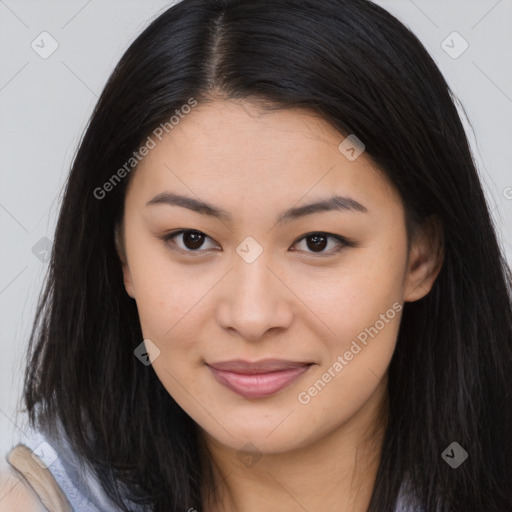 Joyful asian young-adult female with long  brown hair and brown eyes