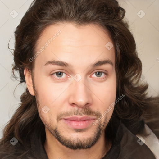 Joyful white young-adult male with medium  brown hair and brown eyes