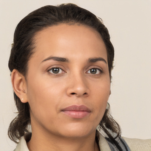 Neutral white young-adult female with medium  brown hair and brown eyes