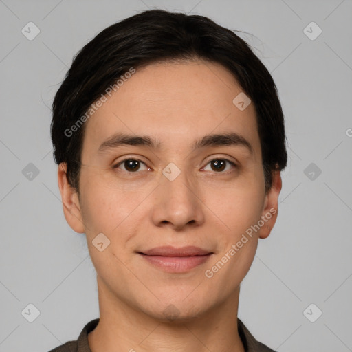 Joyful white young-adult male with short  black hair and brown eyes