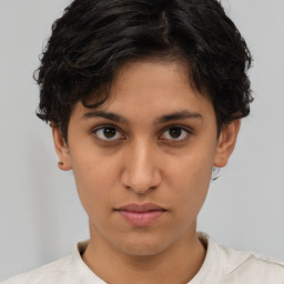 Neutral white young-adult female with short  brown hair and brown eyes