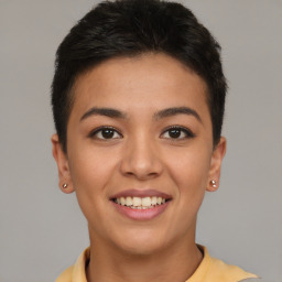 Joyful latino young-adult female with short  brown hair and brown eyes