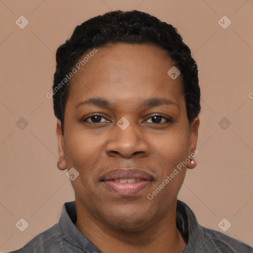 Joyful black young-adult female with short  black hair and brown eyes