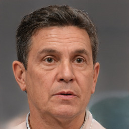 Neutral white middle-aged male with short  brown hair and brown eyes