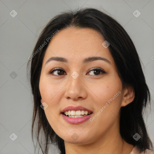 Joyful asian young-adult female with medium  brown hair and brown eyes