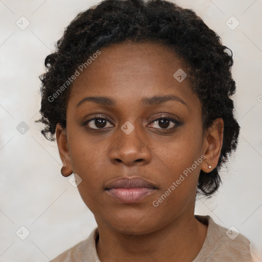 Neutral black young-adult female with short  brown hair and brown eyes