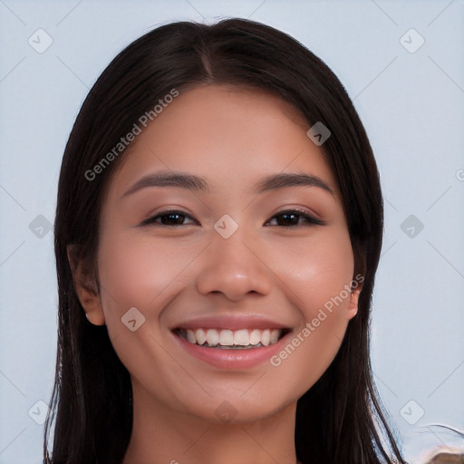 Joyful white young-adult female with long  black hair and brown eyes