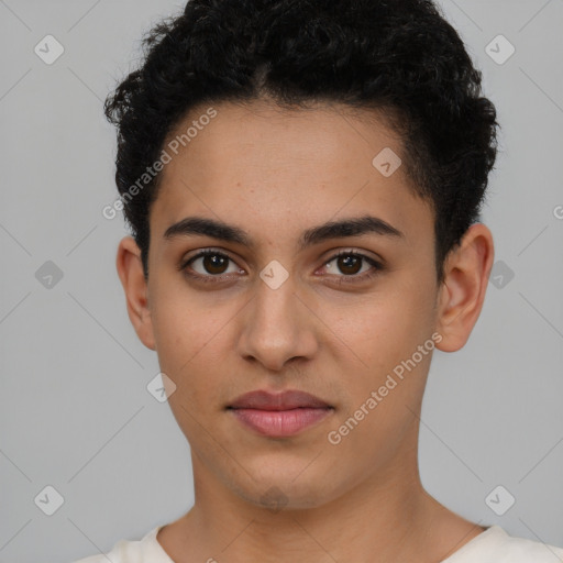 Joyful latino young-adult male with short  brown hair and brown eyes