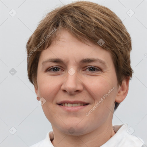 Joyful white young-adult female with short  brown hair and brown eyes