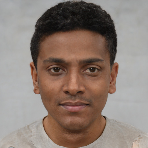 Neutral black young-adult male with short  black hair and brown eyes