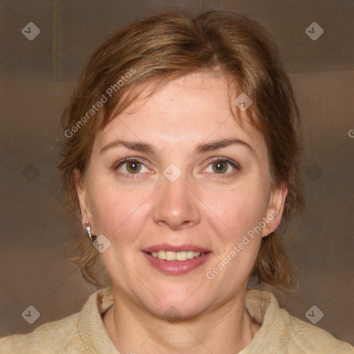 Joyful white adult female with medium  brown hair and green eyes