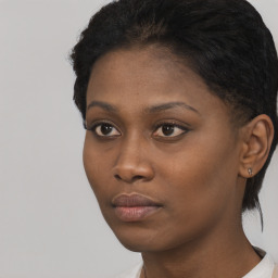 Neutral black young-adult female with short  black hair and brown eyes