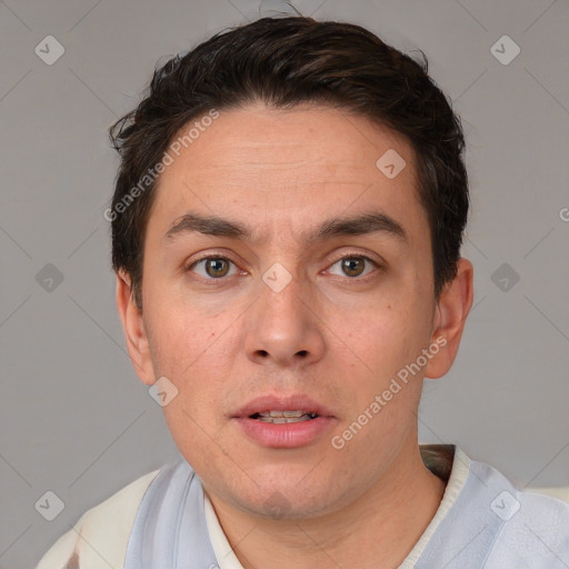 Neutral white young-adult male with short  brown hair and brown eyes