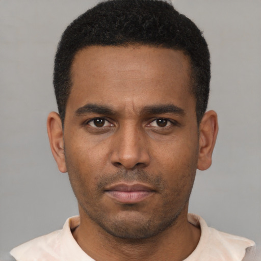Neutral latino young-adult male with short  black hair and brown eyes