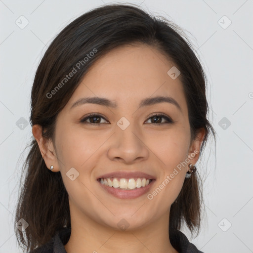 Joyful white young-adult female with long  brown hair and brown eyes