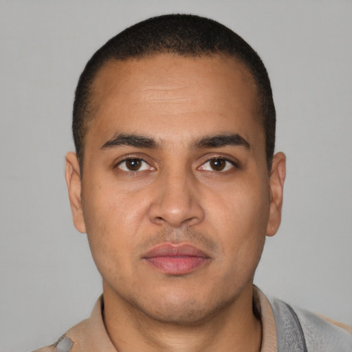Neutral latino young-adult male with short  brown hair and brown eyes