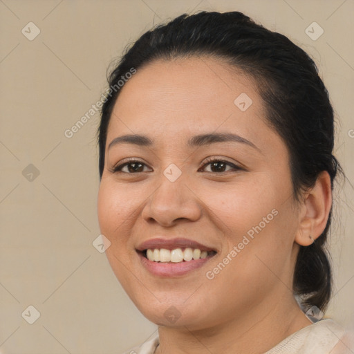 Joyful asian young-adult female with medium  brown hair and brown eyes