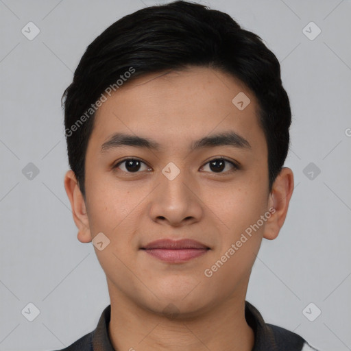 Joyful asian young-adult male with short  black hair and brown eyes