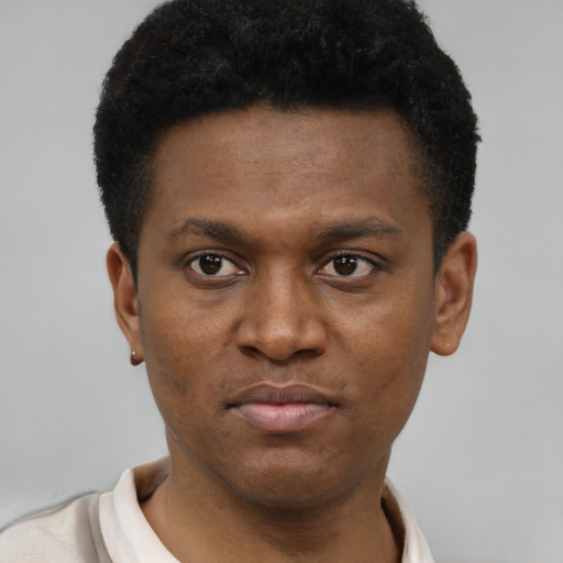 Neutral black young-adult male with short  black hair and brown eyes