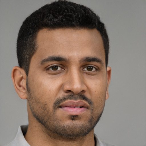 Neutral black young-adult male with short  brown hair and brown eyes