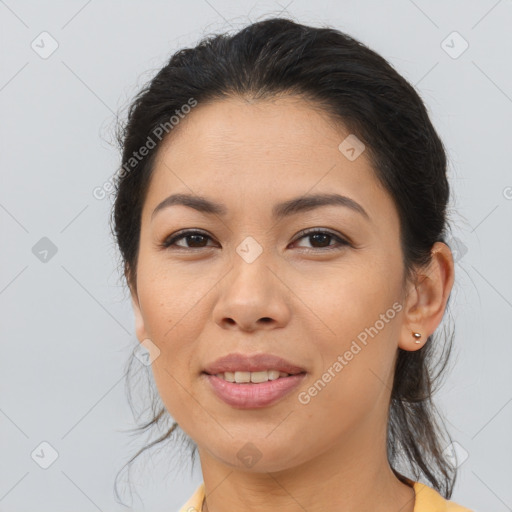 Joyful asian young-adult female with medium  brown hair and brown eyes