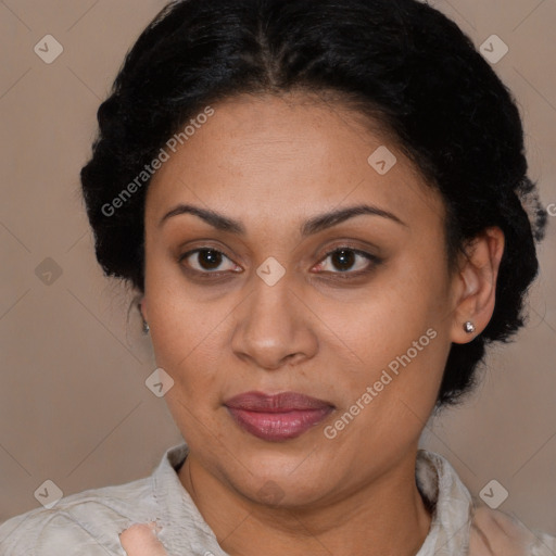 Joyful latino adult female with short  brown hair and brown eyes