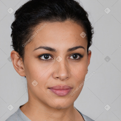 Joyful latino young-adult female with short  brown hair and brown eyes