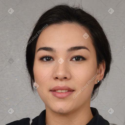 Joyful white young-adult female with medium  black hair and brown eyes