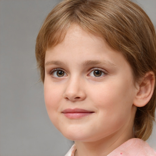 Joyful white child female with medium  brown hair and brown eyes