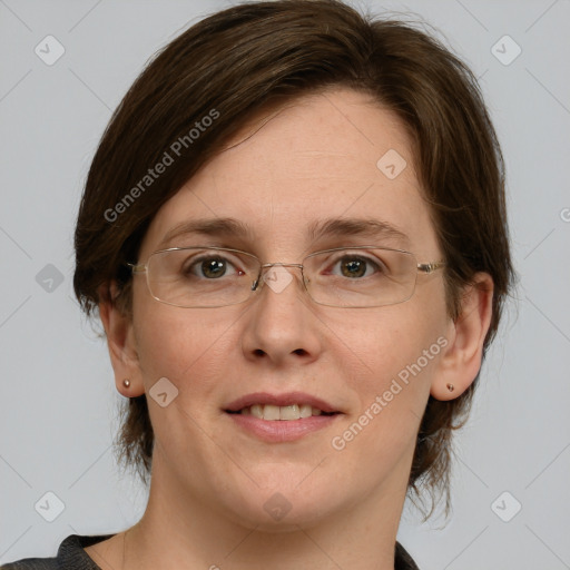 Joyful white young-adult female with medium  brown hair and green eyes