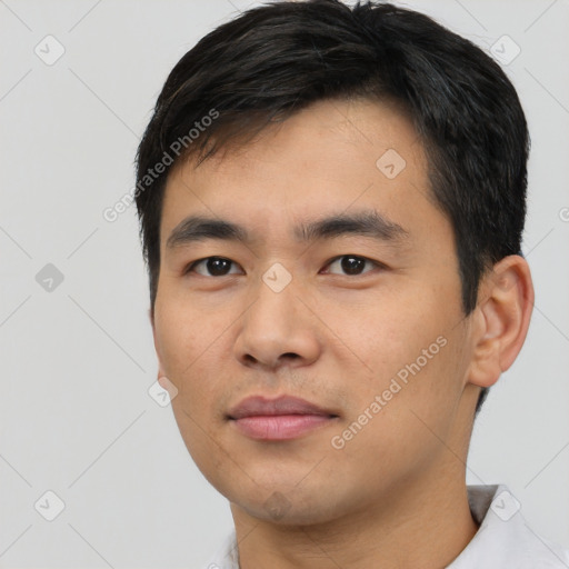 Neutral asian young-adult male with short  black hair and brown eyes