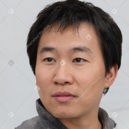 Neutral asian young-adult male with short  brown hair and brown eyes