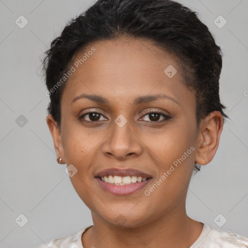 Joyful black young-adult female with short  brown hair and brown eyes