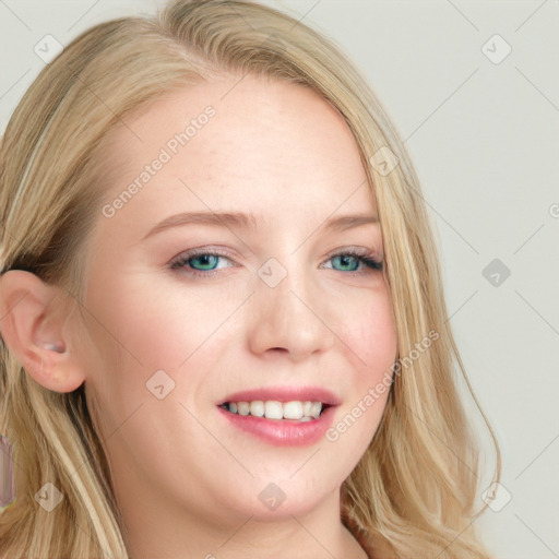 Joyful white young-adult female with long  blond hair and blue eyes