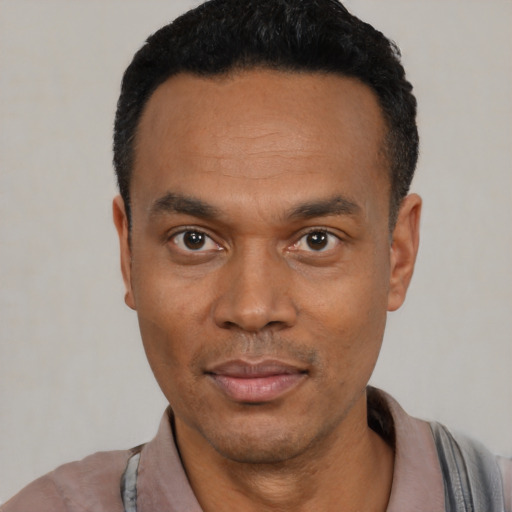 Neutral black young-adult male with short  black hair and brown eyes