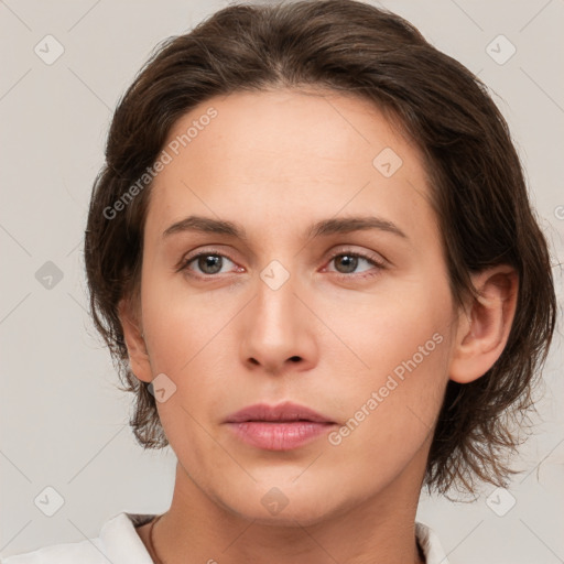 Neutral white young-adult female with medium  brown hair and brown eyes