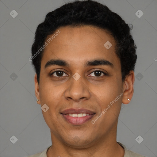 Joyful latino young-adult male with short  black hair and brown eyes