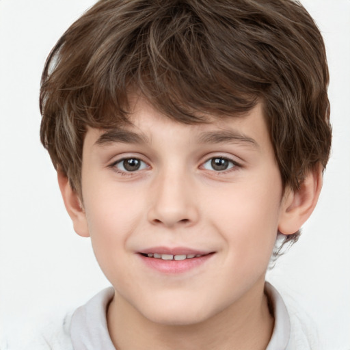 Joyful white child male with short  brown hair and brown eyes