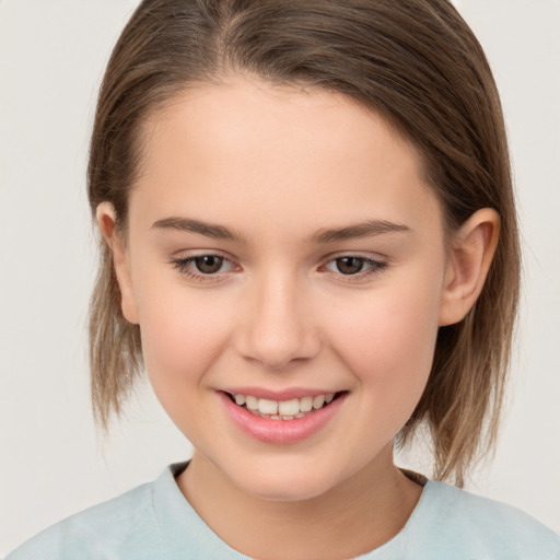 Joyful white child female with medium  brown hair and brown eyes