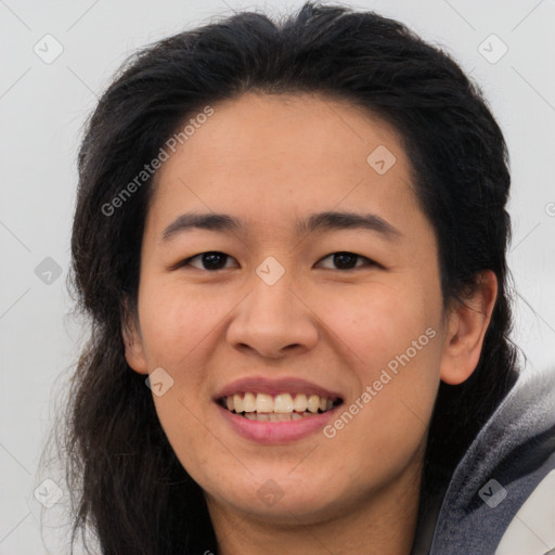 Joyful asian young-adult female with long  brown hair and brown eyes