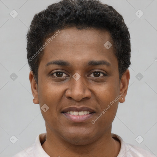 Joyful latino young-adult male with short  brown hair and brown eyes