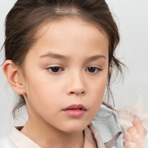 Neutral white child female with medium  brown hair and brown eyes