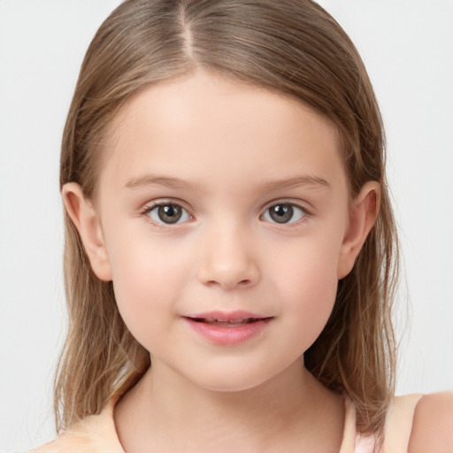 Joyful white child female with medium  brown hair and brown eyes