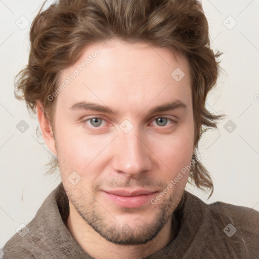 Joyful white young-adult male with short  brown hair and blue eyes