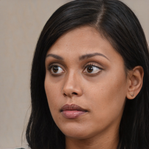 Neutral asian young-adult female with long  brown hair and brown eyes