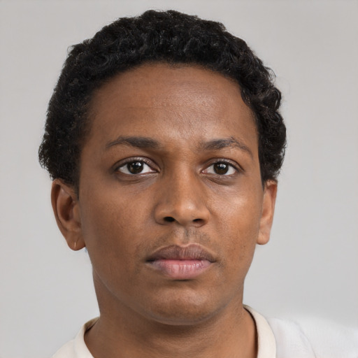 Neutral black young-adult female with short  brown hair and brown eyes