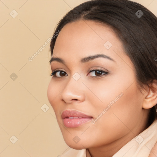 Joyful latino young-adult female with long  brown hair and brown eyes